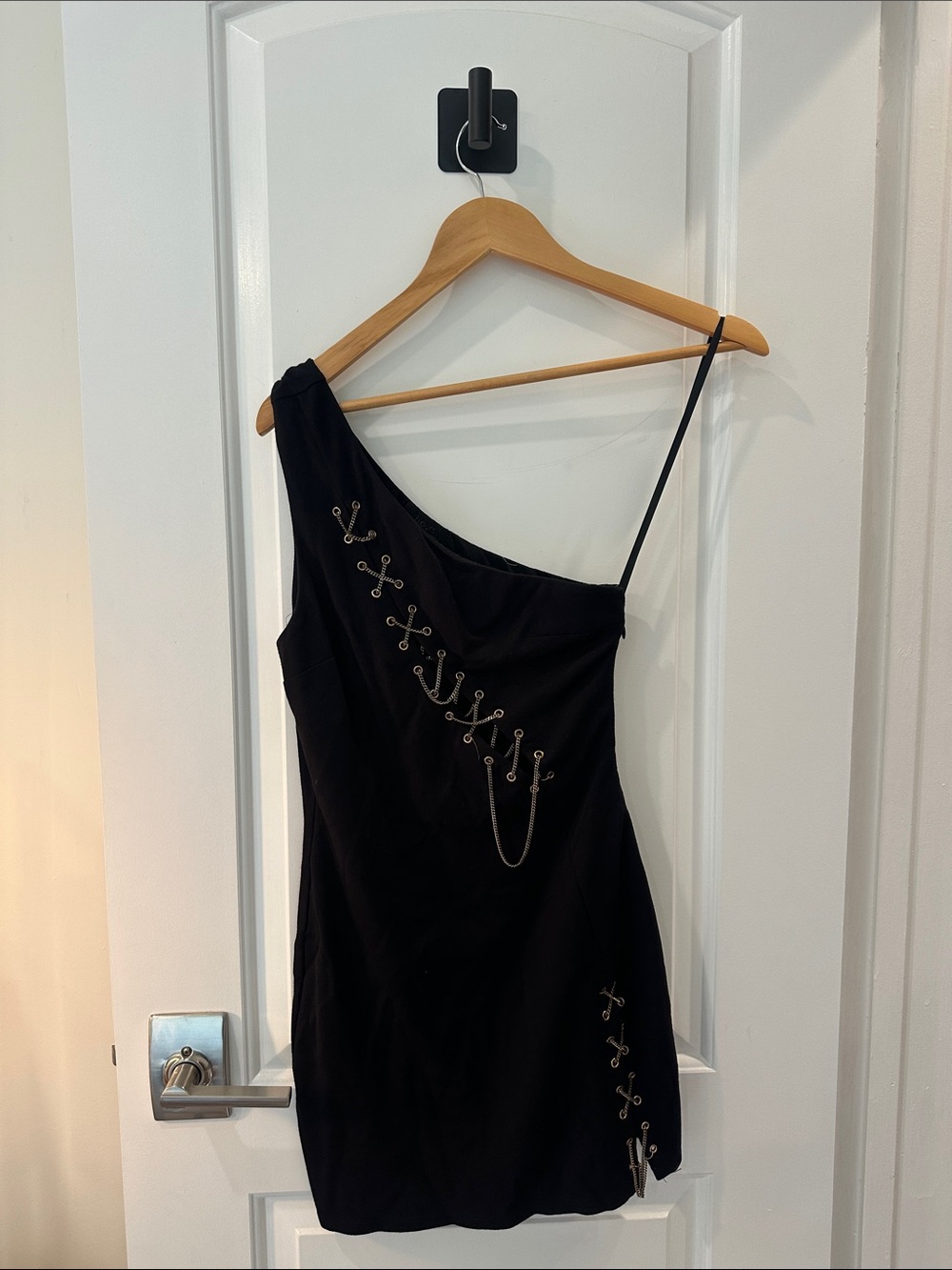 One-Shoulder Black Mini Dress with Chain Eyelet Detail
